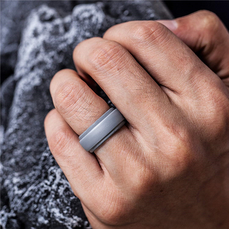 man wearing grey silicone ring Dura Gear comfortable flexible mens ring everyday lifestyle use