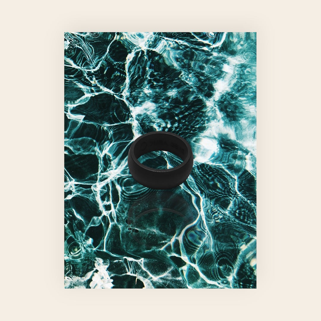 Dura Gear The Easy black silicone ring on water background