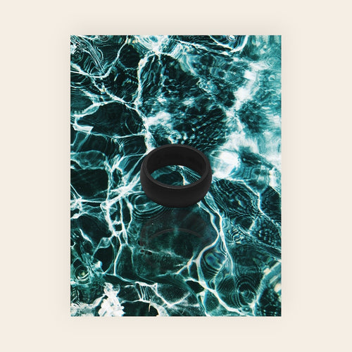 Dura Gear The Easy black silicone ring on water background